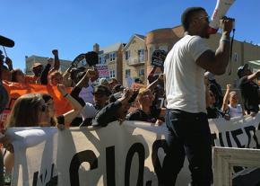 Protesters march through Queens to demand the closure of Rikers Island jail